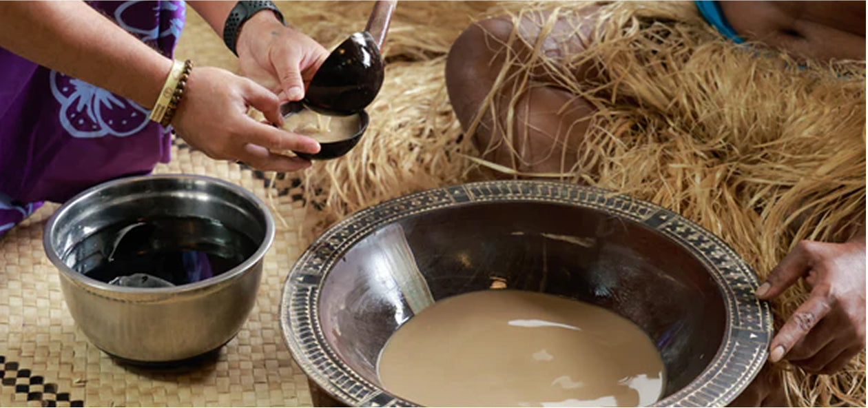 Preparing kava in a traditional tanoa bowl